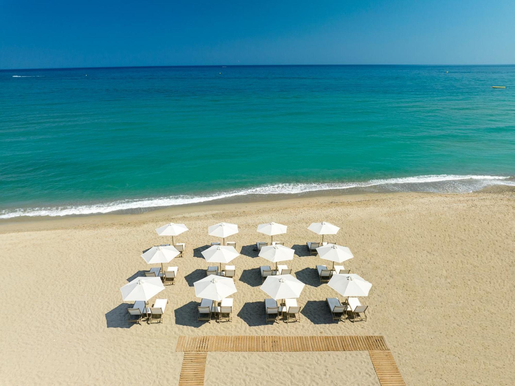 Calla Luxury Seafront Suites 罗希姆诺 外观 照片